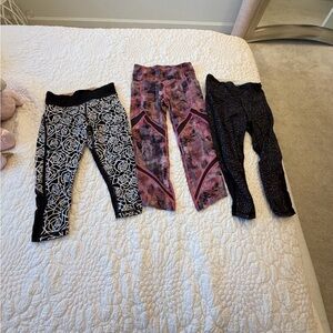 3 pairs LULULEMON Leggings Set - Black, Pink, and Multicolor…Length: Below Knee